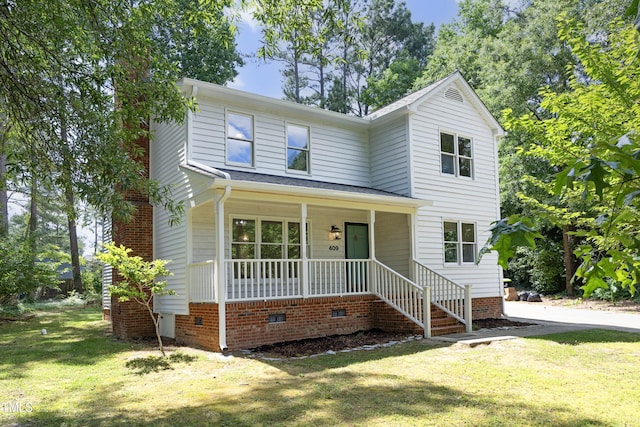409 Glaive Dr, Durham, NC 27703 - traditional-style home with a porch, a front lawn, and crawl space