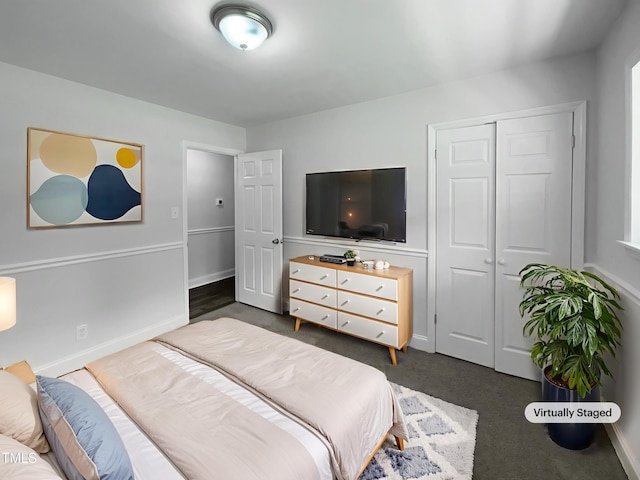 1914 Adams Pl, Hillsborough, NC 27278 - bedroom with dark carpet and a closet