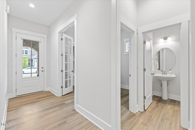 857 Whistable Ave, Wake Forest, NC 27587 - entryway with light wood-style floors and baseboards