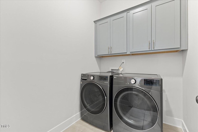 857 Whistable Ave, Wake Forest, NC 27587 - laundry room featuring cabinet space, baseboards, and separate washer and dryer