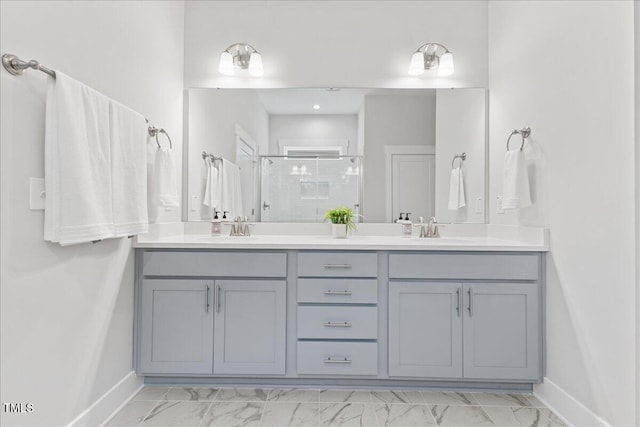 857 Whistable Ave, Wake Forest, NC 27587 - bathroom with baseboards, a shower stall, double vanity, and marble finish floors