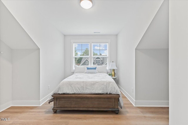 857 Whistable Ave, Wake Forest, NC 27587 - bedroom featuring wood finished floors and baseboards