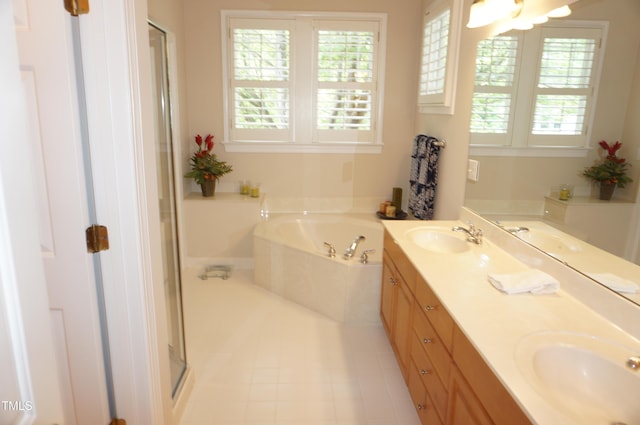 4810 Glenmist Ct, Raleigh, NC 27612 - full bath with a garden tub, double vanity, a shower stall, and tile patterned flooring