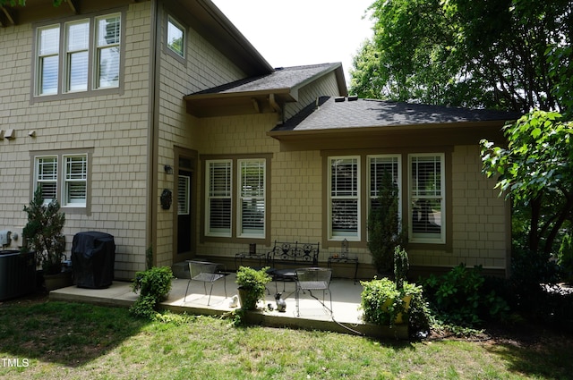 4810 Glenmist Ct, Raleigh, NC 27612 - rear view of property with a patio area and central air condition unit