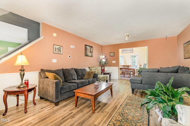 713 Saint Catherines Dr, Wake Forest, NC 27587 - living room featuring light wood-style floors and ceiling fan
