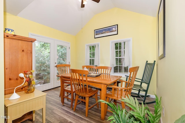 713 Saint Catherines Dr, Wake Forest, NC 27587 - dining room with lofted ceiling, a ceiling fan, and wood finished floors