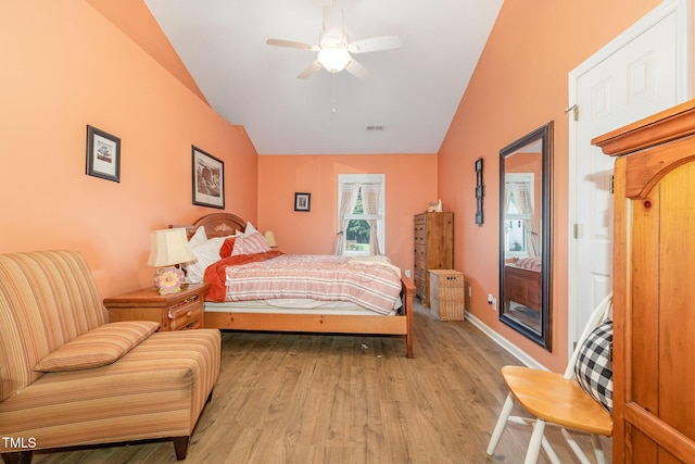 713 Saint Catherines Dr, Wake Forest, NC 27587 - bedroom featuring vaulted ceiling, light wood-style flooring, and ceiling fan