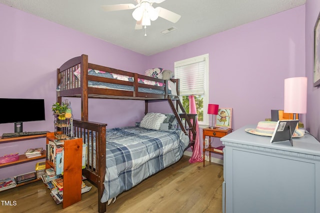 713 Saint Catherines Dr, Wake Forest, NC 27587 - bedroom with wood finished floors and ceiling fan