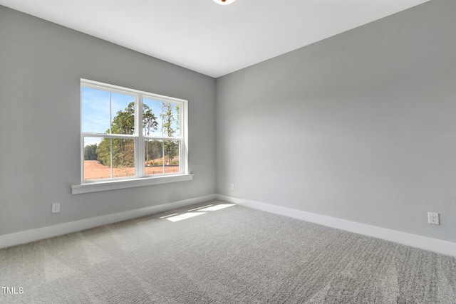 1100 Balsawood Dr Unit 5, Durham, NC 27705 - carpeted spare room with baseboards