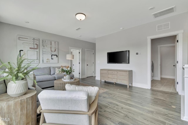 1100 Balsawood Dr Unit 5, Durham, NC 27705 - living room with wood finished floors and baseboards