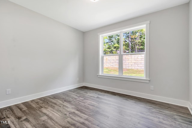 1100 Balsawood Dr Unit 5, Durham, NC 27705 - spare room with baseboards and wood finished floors