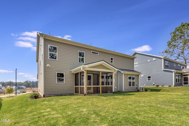 1100 Balsawood Dr Unit 5, Durham, NC 27705 - back of house featuring a sunroom, a yard, and central AC