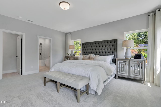 1100 Balsawood Dr Unit 5, Durham, NC 27705 - bedroom featuring carpet flooring, baseboards, and connected bathroom