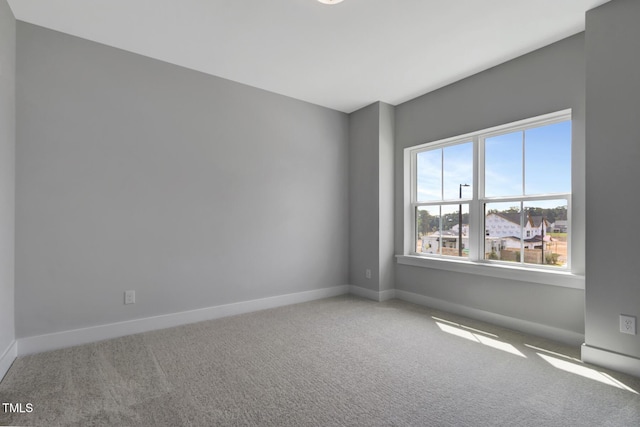 1100 Balsawood Dr Unit 5, Durham, NC 27705 - empty room with carpet floors and baseboards
