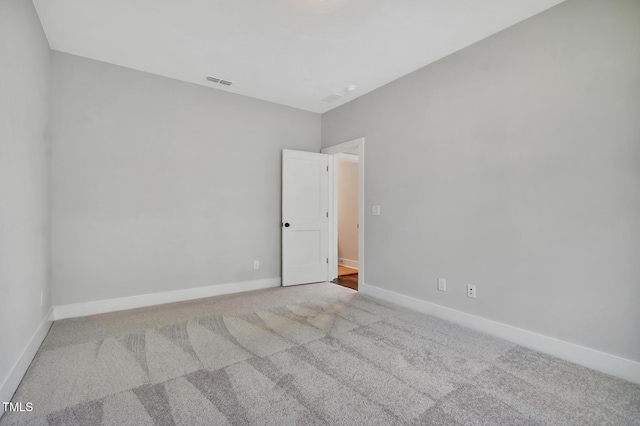 1100 Balsawood Dr Unit 5, Durham, NC 27705 - spare room featuring carpet floors and baseboards