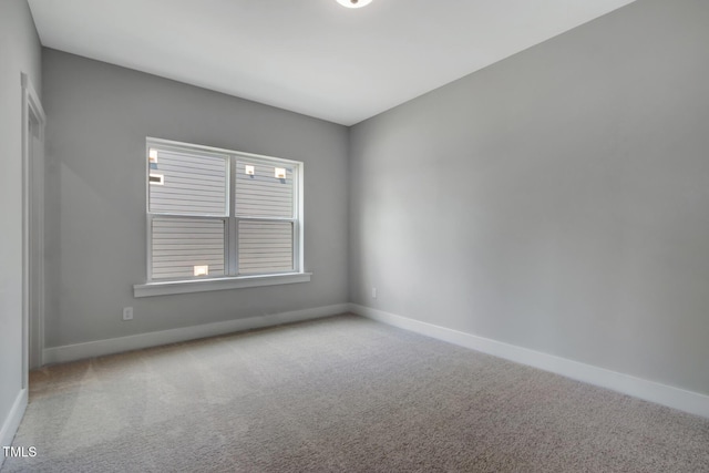 1100 Balsawood Dr Unit 5, Durham, NC 27705 - spare room with carpet flooring and baseboards
