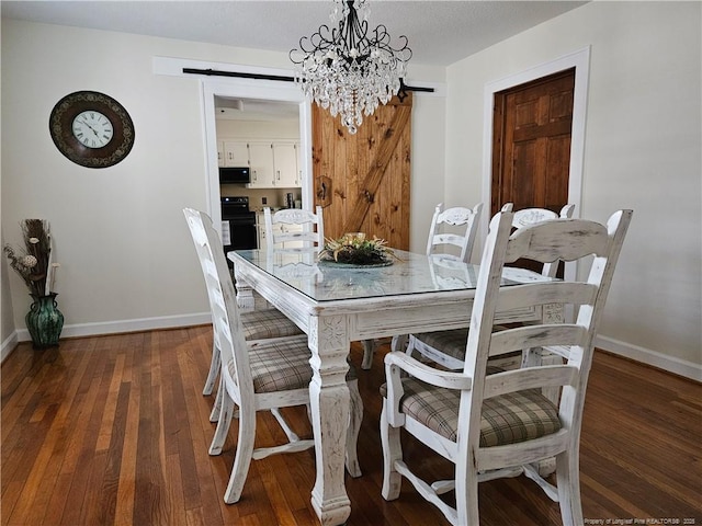 3647 Olivia Rd, Sanford, NC 27332 - dining room featuring a barn door, hardwood / wood-style flooring, baseboards, and a chandelier