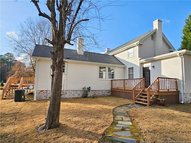 3647 Olivia Rd, Sanford, NC 27332 - rear view of property featuring a deck, stairs, a chimney, and roof with shingles