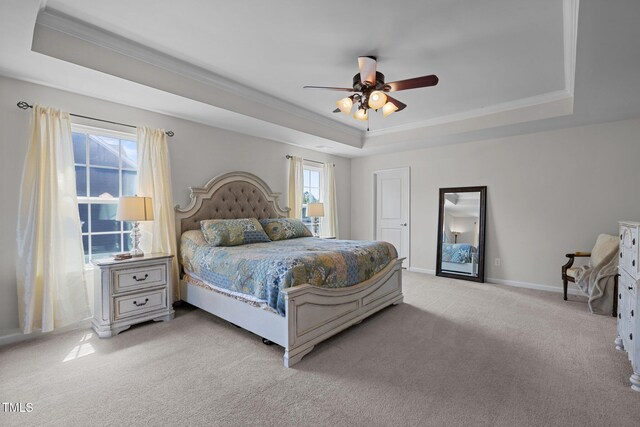 204 Ashland Hill Dr, Holly Springs, NC 27540 - bedroom featuring a raised ceiling, light colored carpet, ornamental molding, multiple windows, and baseboards