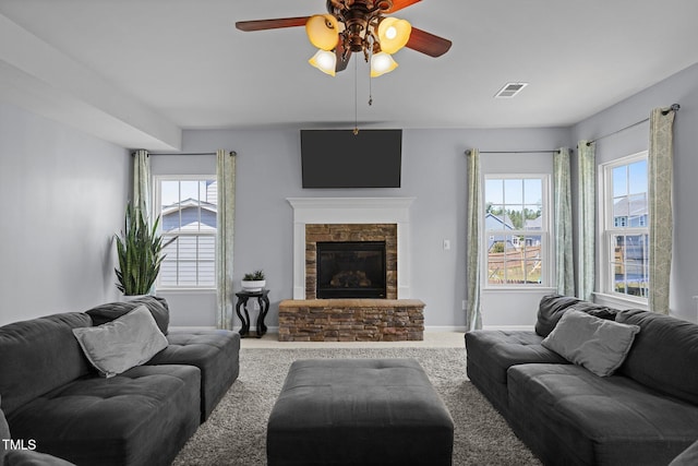 204 Ashland Hill Dr, Holly Springs, NC 27540 - carpeted living area featuring ceiling fan, a fireplace, and baseboards
