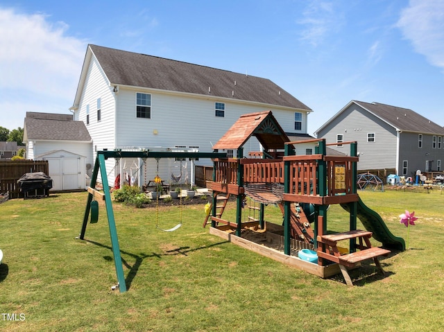 204 Ashland Hill Dr, Holly Springs, NC 27540 - rear view of house featuring a playground and a shingled roof