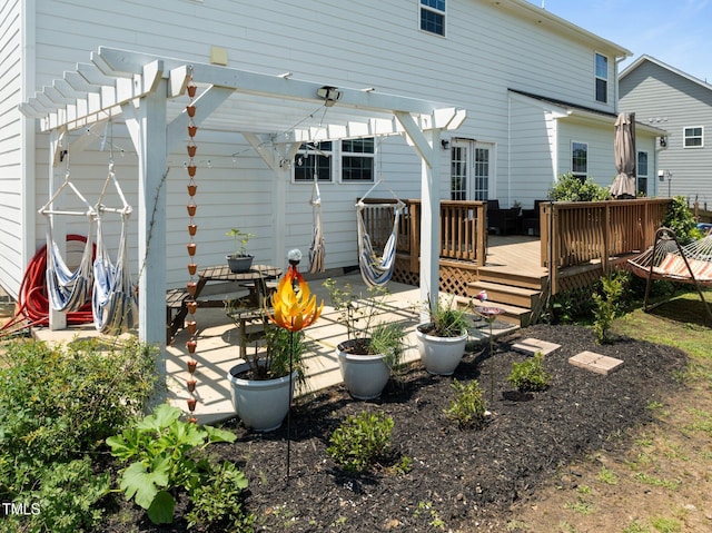 204 Ashland Hill Dr, Holly Springs, NC 27540 - rear view of property with a pergola, a wooden deck, and a patio