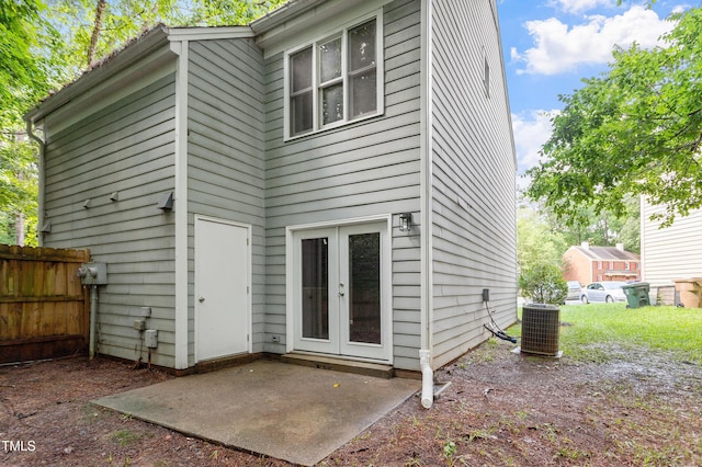118 Rhum Pl, Garner, NC 27529 - back of house featuring central AC unit, french doors, and a patio area