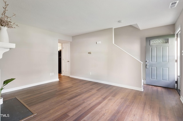 118 Rhum Pl, Garner, NC 27529 - entrance foyer with wood finished floors and baseboards