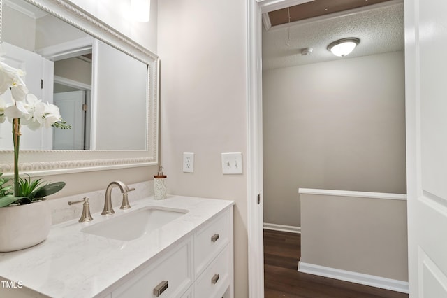 118 Rhum Pl, Garner, NC 27529 - bathroom featuring vanity, wood finished floors, and baseboards