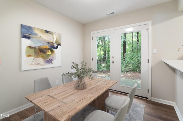 118 Rhum Pl, Garner, NC 27529 - dining space with baseboards and dark wood-type flooring