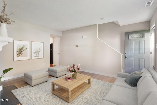 118 Rhum Pl, Garner, NC 27529 - living room with light wood-type flooring and baseboards