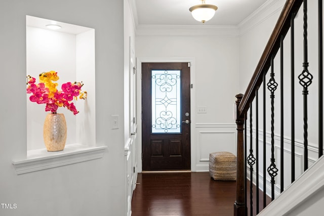 329 Castle Rock Ln, Cary, NC 27519 - foyer featuring wood finished floors, ornamental molding, and stairs