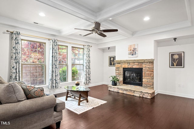 329 Castle Rock Ln, Cary, NC 27519 - living area with a fireplace, beam ceiling, dark wood-type flooring, ceiling fan, and crown molding