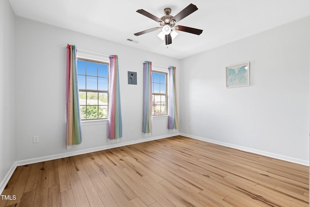 329 Castle Rock Ln, Cary, NC 27519 - empty room featuring light wood finished floors and ceiling fan