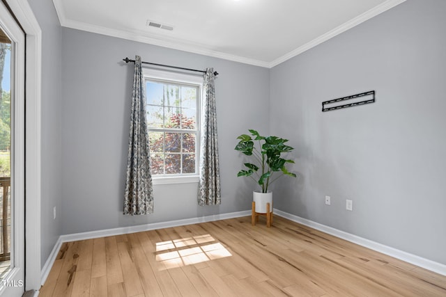 329 Castle Rock Ln, Cary, NC 27519 - unfurnished room featuring light wood-style flooring and crown molding