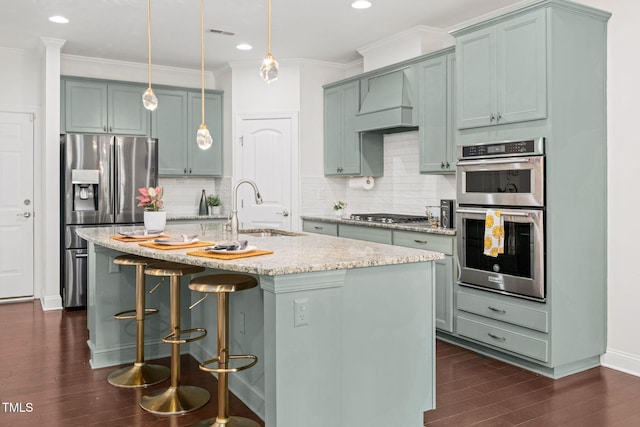 329 Castle Rock Ln, Cary, NC 27519 - kitchen featuring stainless steel appliances, premium range hood, dark wood-style floors, light stone counters, and crown molding