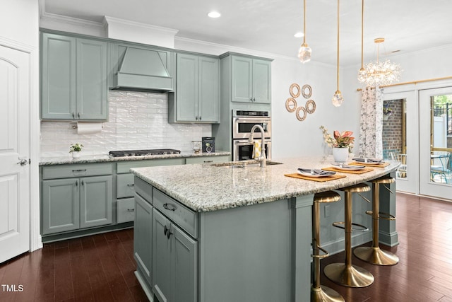 329 Castle Rock Ln, Cary, NC 27519 - kitchen with custom range hood, dark wood-type flooring, stainless steel appliances, ornamental molding, and decorative backsplash