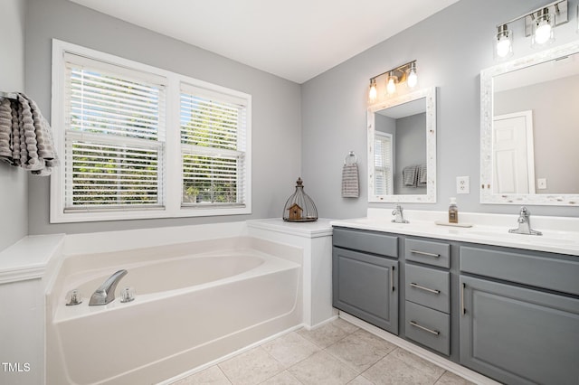 408 Heritage Village Ln, Apex, NC 27502 - bathroom featuring double vanity, a bath, and tile patterned flooring