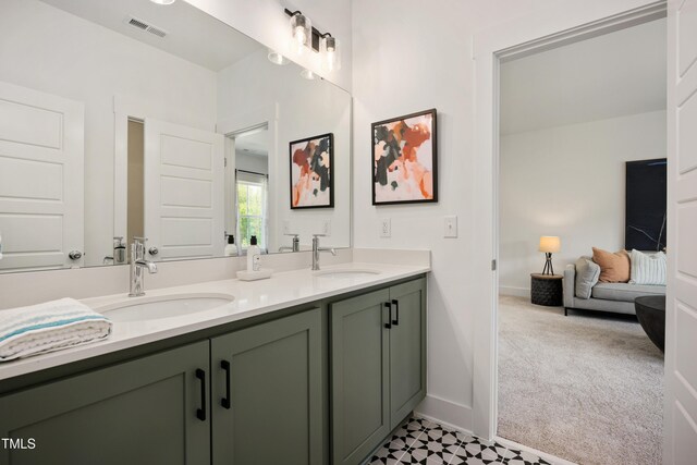 134 Beacon Dr, Pittsboro, NC 27312 - bathroom with double vanity and baseboards