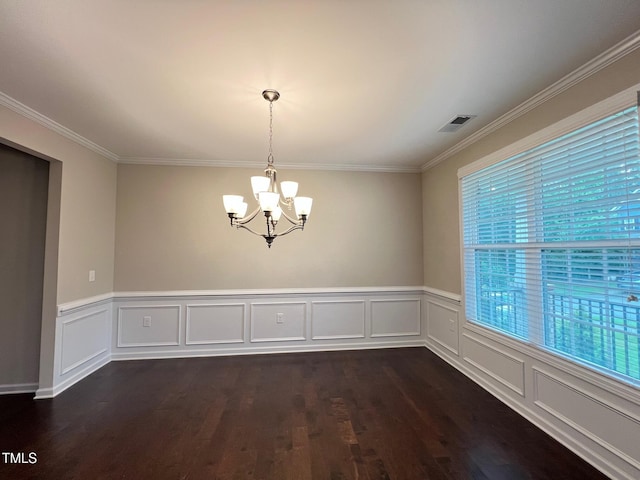 1746 Hammocks Beach Trl, Apex, NC 27502 - empty room with a chandelier, dark wood-style floors, crown molding, a wainscoted wall, and a decorative wall