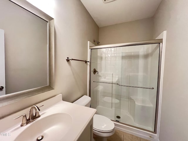 1746 Hammocks Beach Trl, Apex, NC 27502 - full bath featuring toilet, a shower stall, vanity, and tile patterned floors