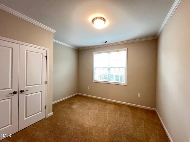 1746 Hammocks Beach Trl, Apex, NC 27502 - unfurnished bedroom featuring carpet, ornamental molding, baseboards, and a closet
