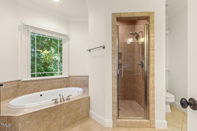 3124 Briar Stream Run, Raleigh, NC 27612 - full bath featuring crown molding, a garden tub, a shower stall, toilet, and tile patterned floors