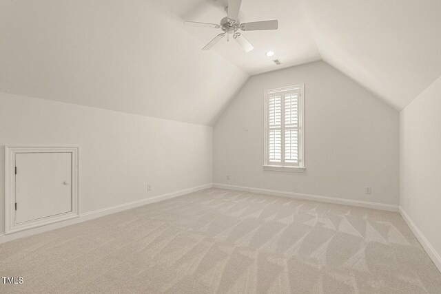 3124 Briar Stream Run, Raleigh, NC 27612 - additional living space with light colored carpet, lofted ceiling, baseboards, and ceiling fan