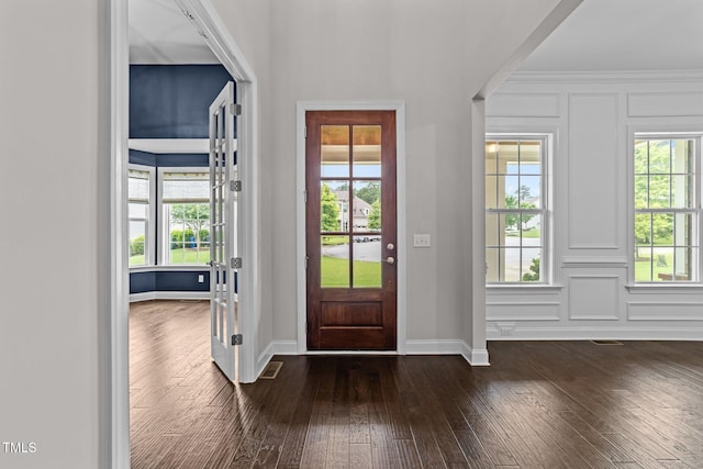 7502 Latteri Ct, Raleigh, NC 27613 - foyer entrance with dark wood-type flooring and plenty of natural light