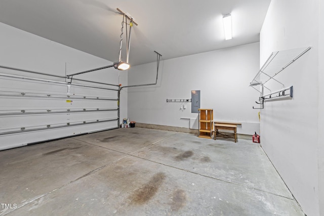 7502 Latteri Ct, Raleigh, NC 27613 - garage with a garage door opener and electric panel