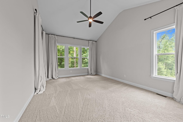 7502 Latteri Ct, Raleigh, NC 27613 - spare room with vaulted ceiling, a ceiling fan, carpet floors, and plenty of natural light