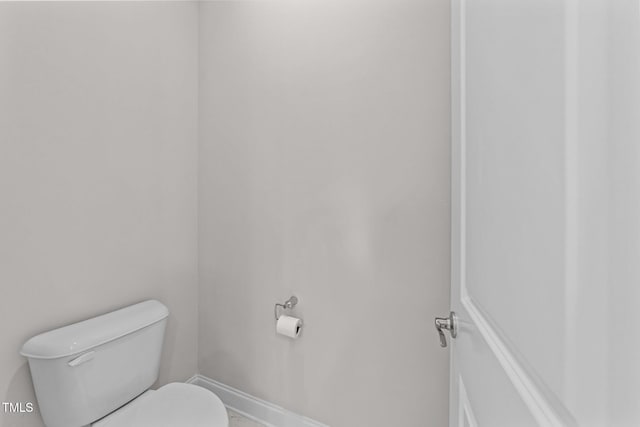 7502 Latteri Ct, Raleigh, NC 27613 - bathroom with toilet and baseboards