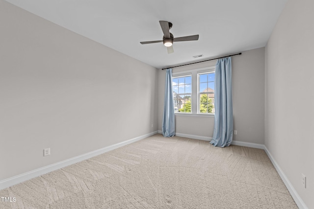 7502 Latteri Ct, Raleigh, NC 27613 - empty room with a ceiling fan and light colored carpet