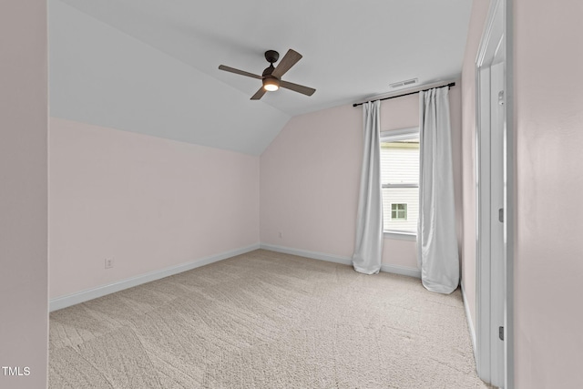 7502 Latteri Ct, Raleigh, NC 27613 - additional living space with vaulted ceiling, ceiling fan, and carpet flooring